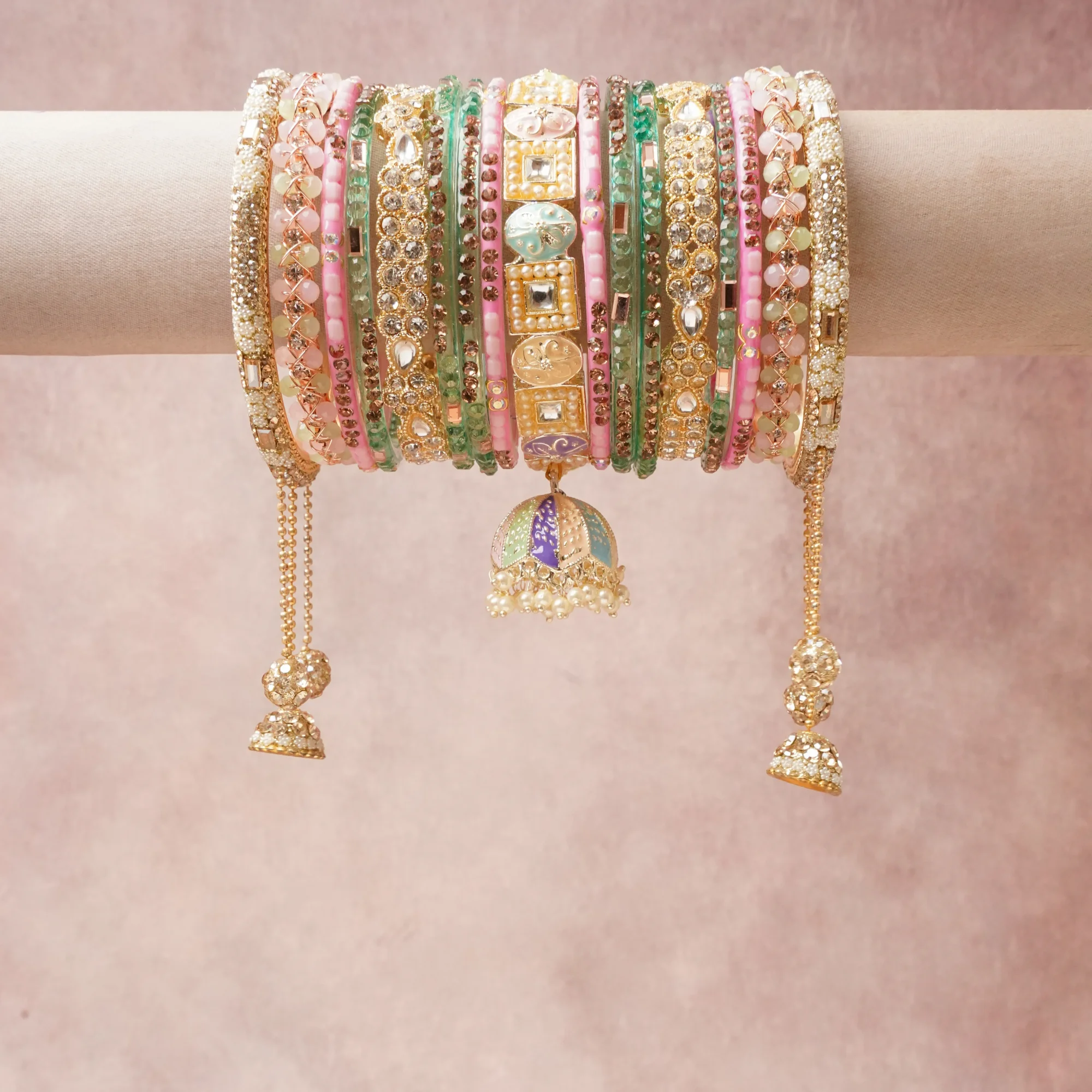 A commanding Gold anchors this beautiful set, enriched with accents of Cream, Teal, Mint Green, Clear, Lavender, Bronze, Blush Pink, Pastel Yellow that add depth and dimension.

Featuring a striking composition of Gold-toned Metal, Clear Crystals, Pearls, Glass Beads, Resin Beads, Enamel, this set carries intricate craftsmanship and strong presence. Grand in form, it is created for moments that deserve to be marked.